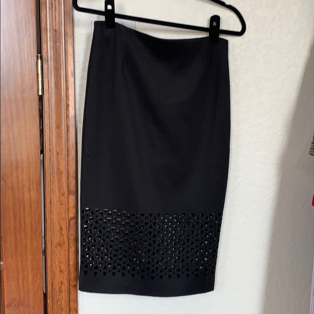 Never worn black laser cut midi pencil skirt